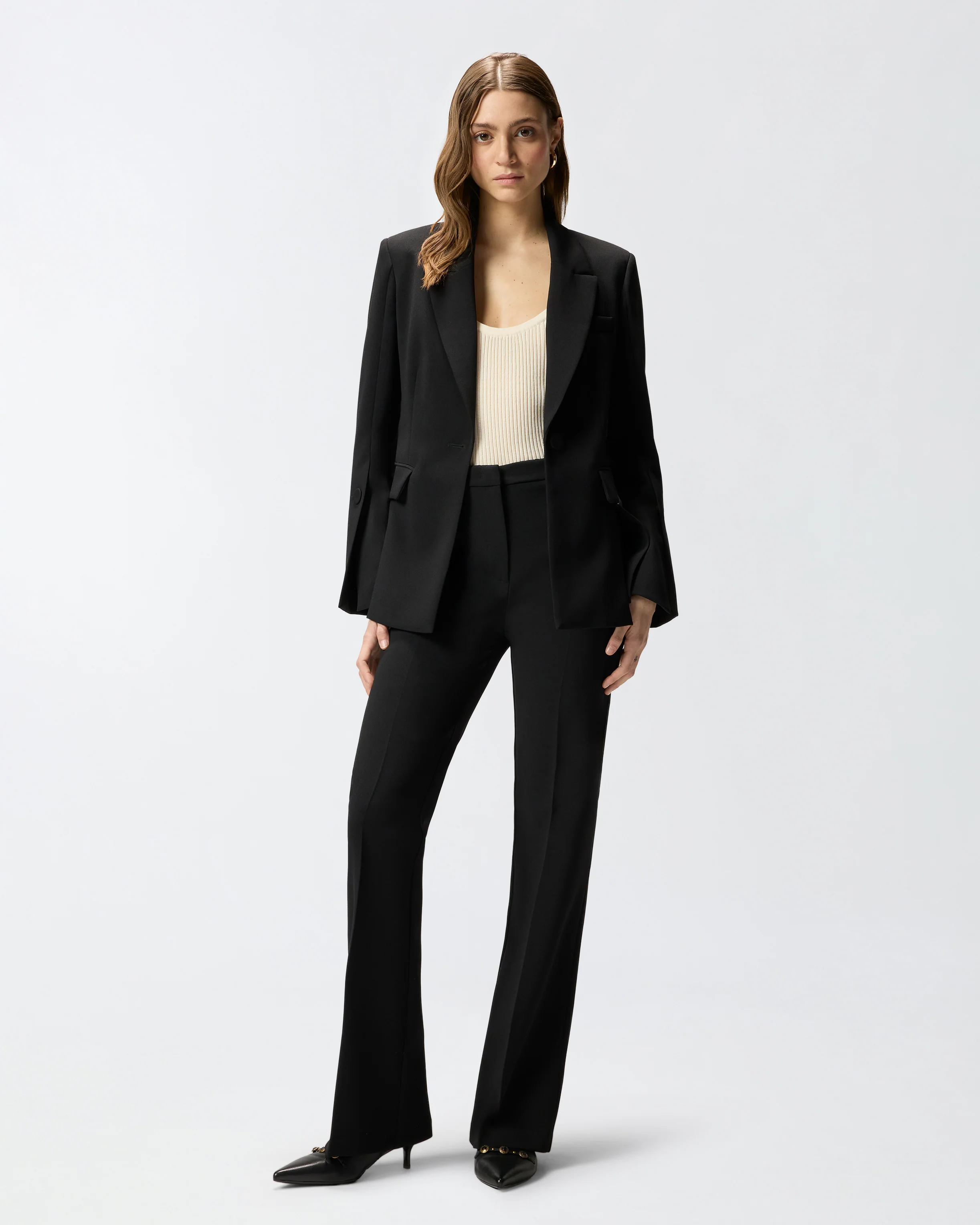 Pantaloni con piega stirata
