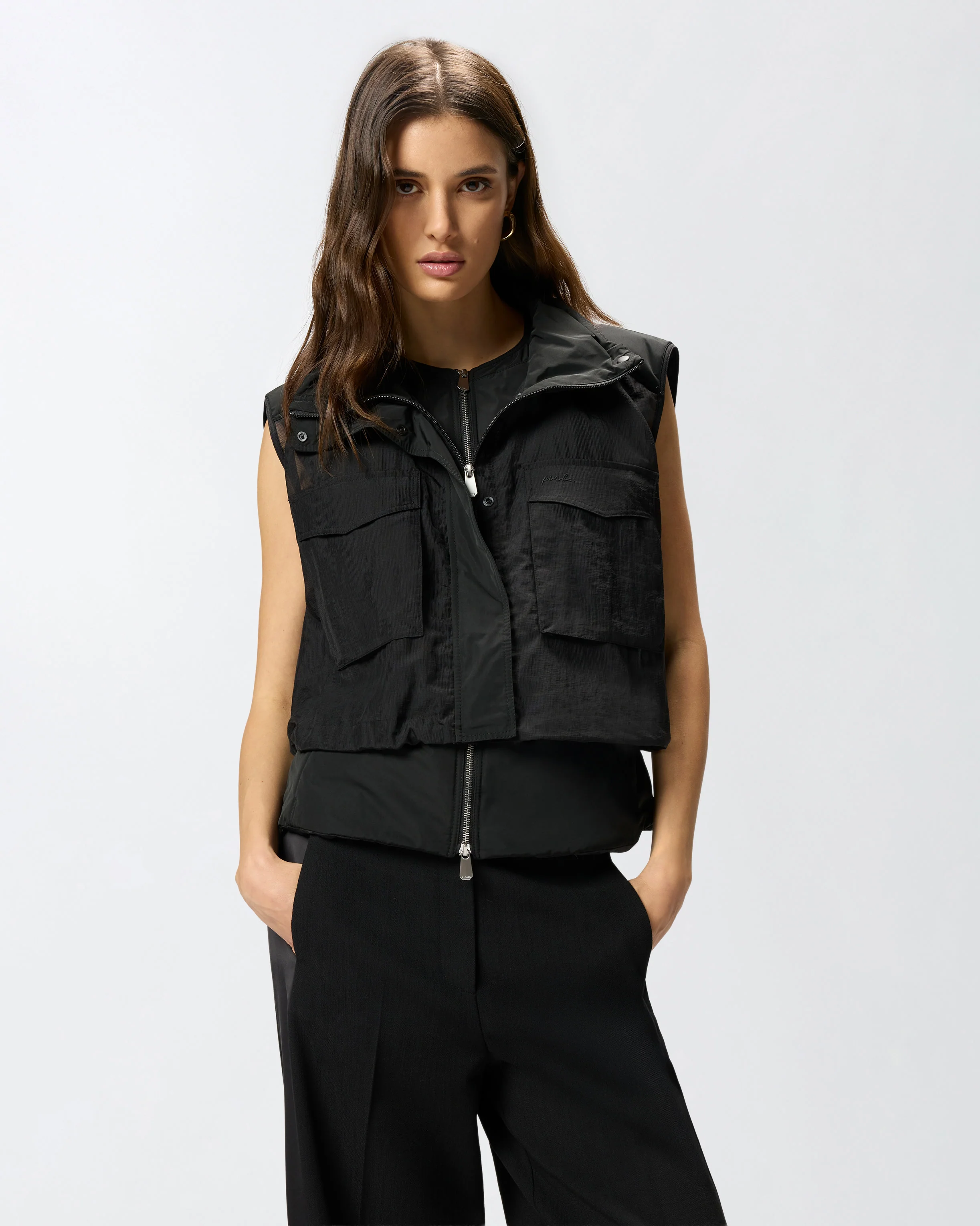 Piumino smanicato con coulisse
